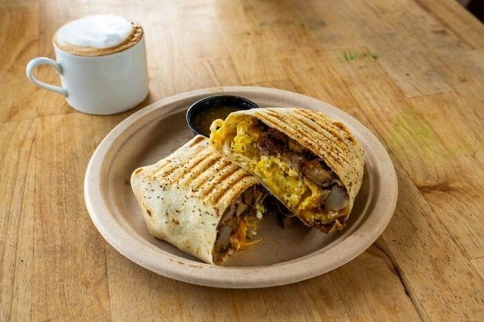 Breakfast burrito with a latte
