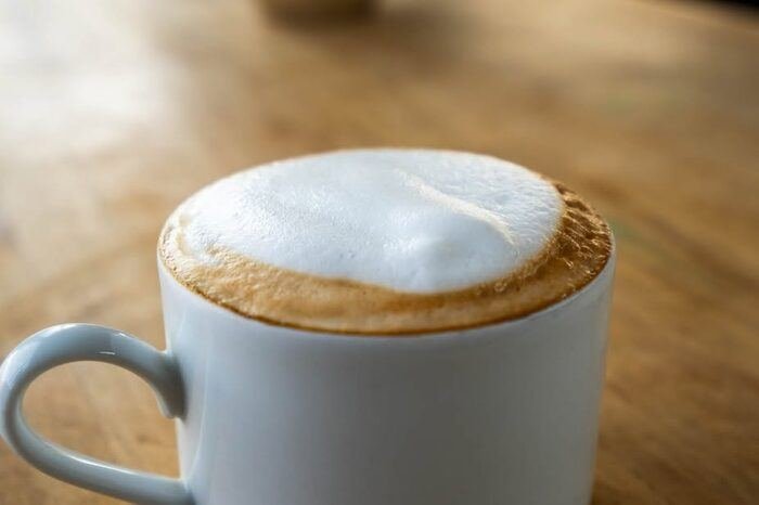 Latte with foam close-up