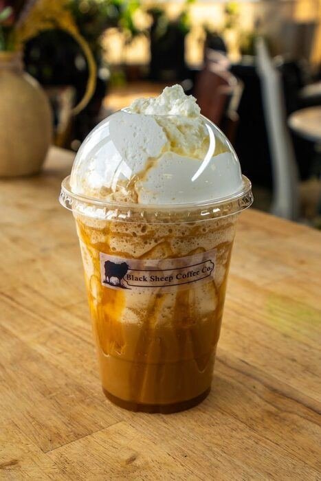 Iced caramel drink with whipped cream