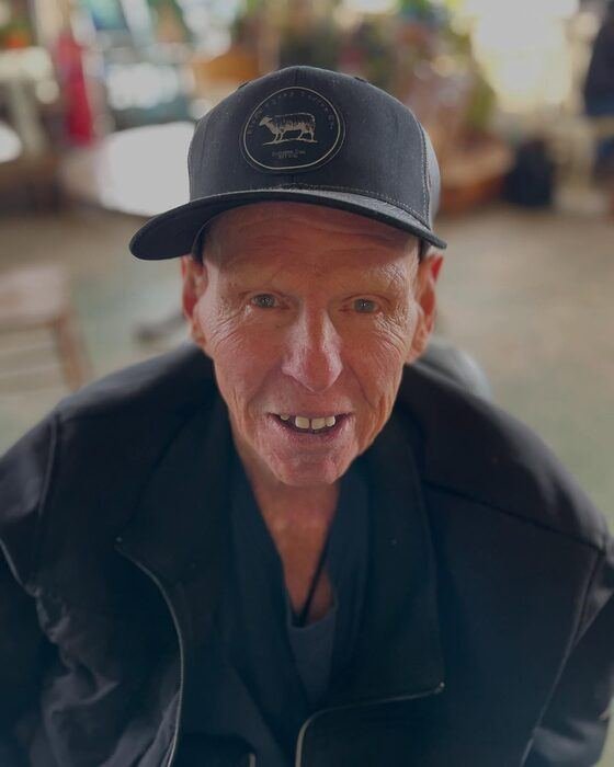 Customer wearing a Black Sheep Coffee hat